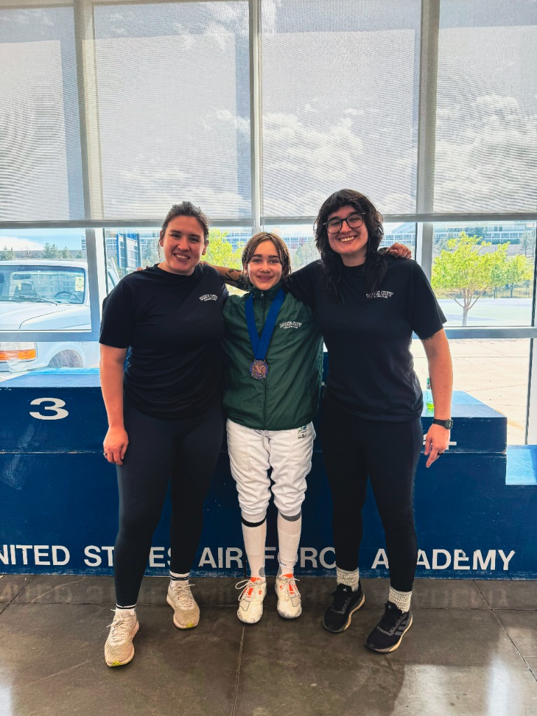 Zoe with Head Coach Courtney Hurley and Coach Bella