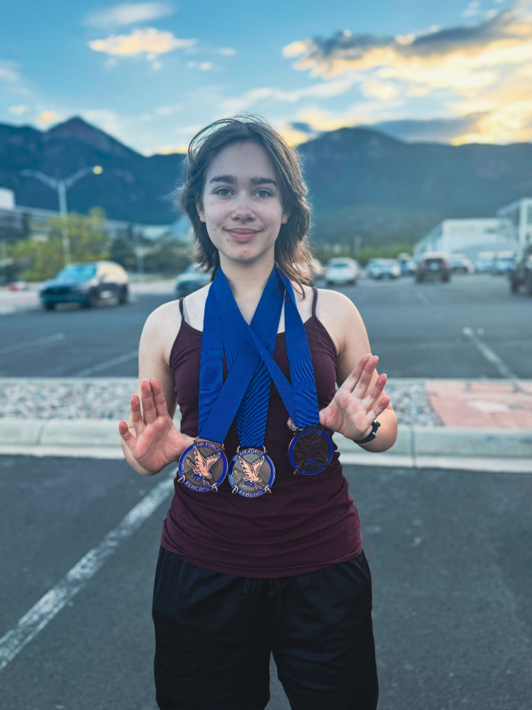 Zoe with 3 medals at the Air Force ROC & RJCC